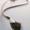 Ormé Pendant Edition Silver in rhodium with Taupe Leather